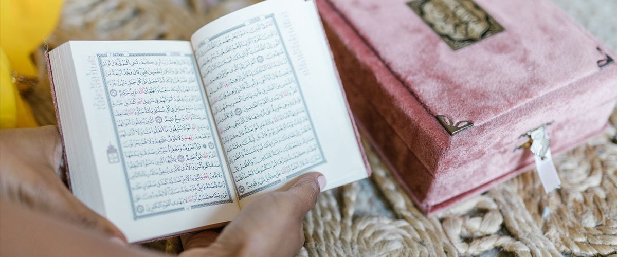 holding open quran
